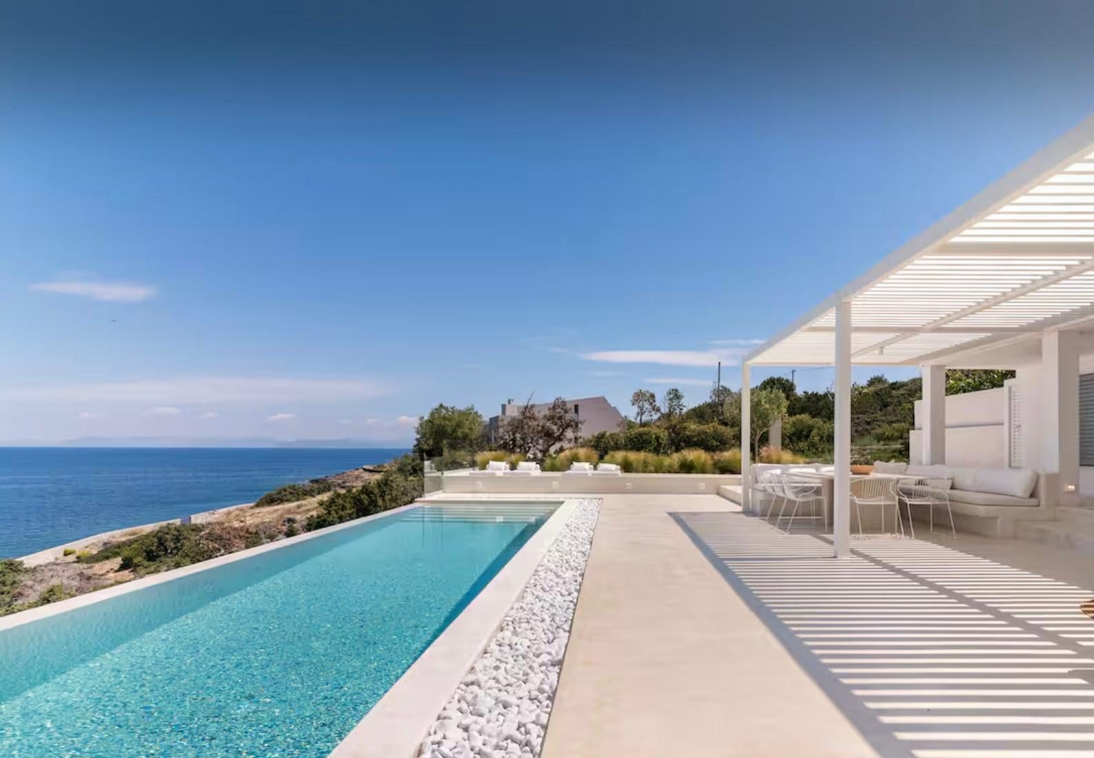Clifftop infinity pool over the Aegean